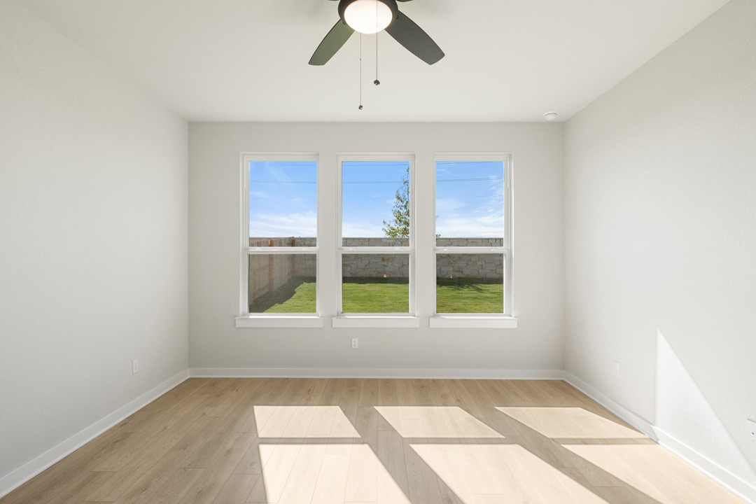 200 Brandywine Road Hutto, TX 78634 - Photo 21 of 39 a view of an empty room with a window