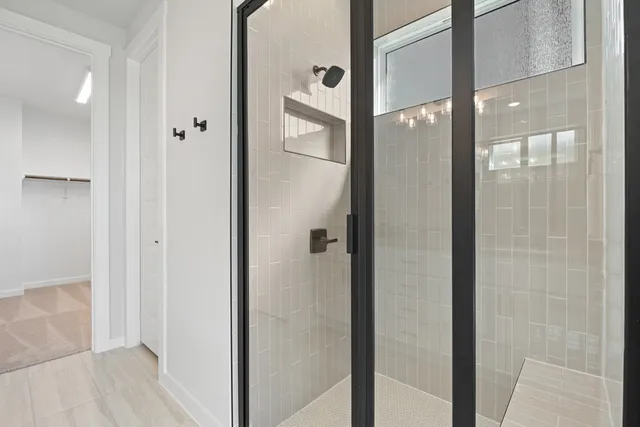 a view of a bathroom from a hallway