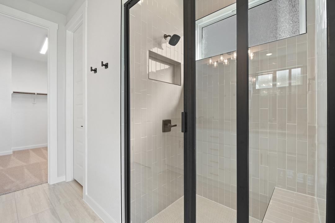 200 Brandywine Road Hutto, TX 78634 - Photo 24 of 39 a view of a bathroom from a hallway