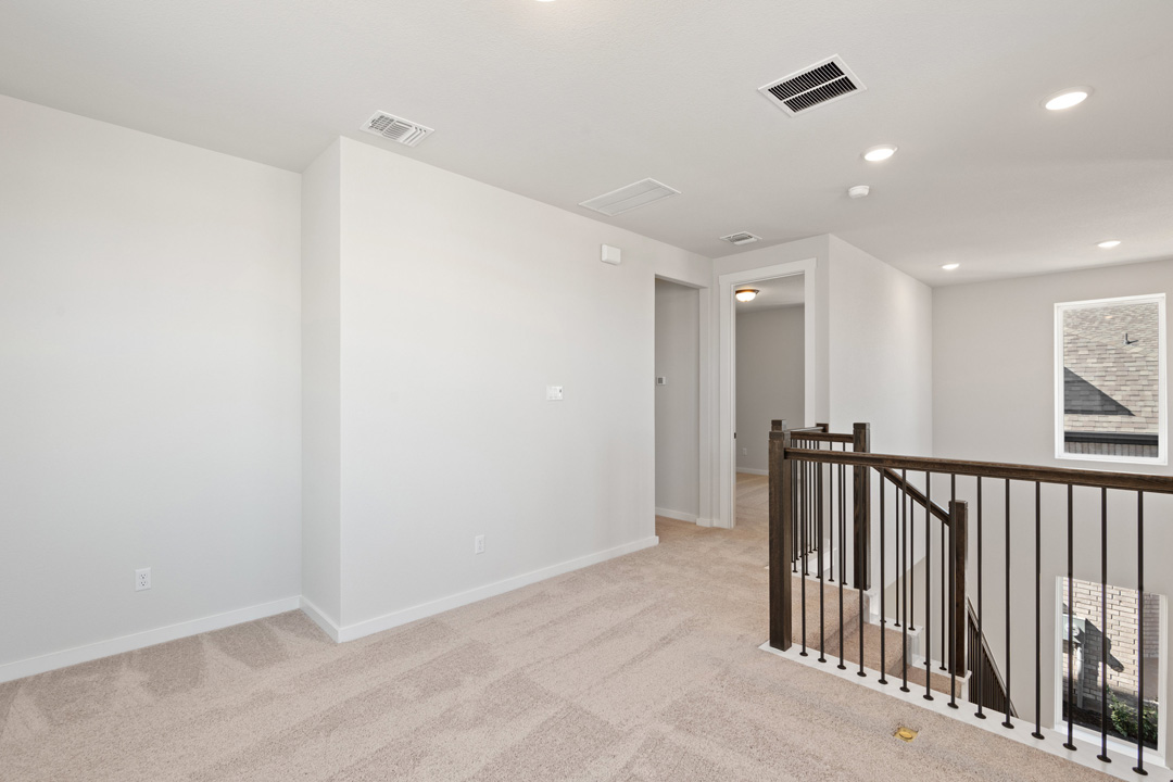 200 Brandywine Road Hutto, TX 78634 - Photo 26 of 39 a view of hallway with a window