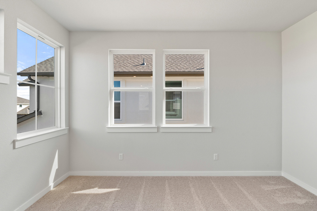 200 Brandywine Road Hutto, TX 78634 - Photo 27 of 39 an empty room with windows