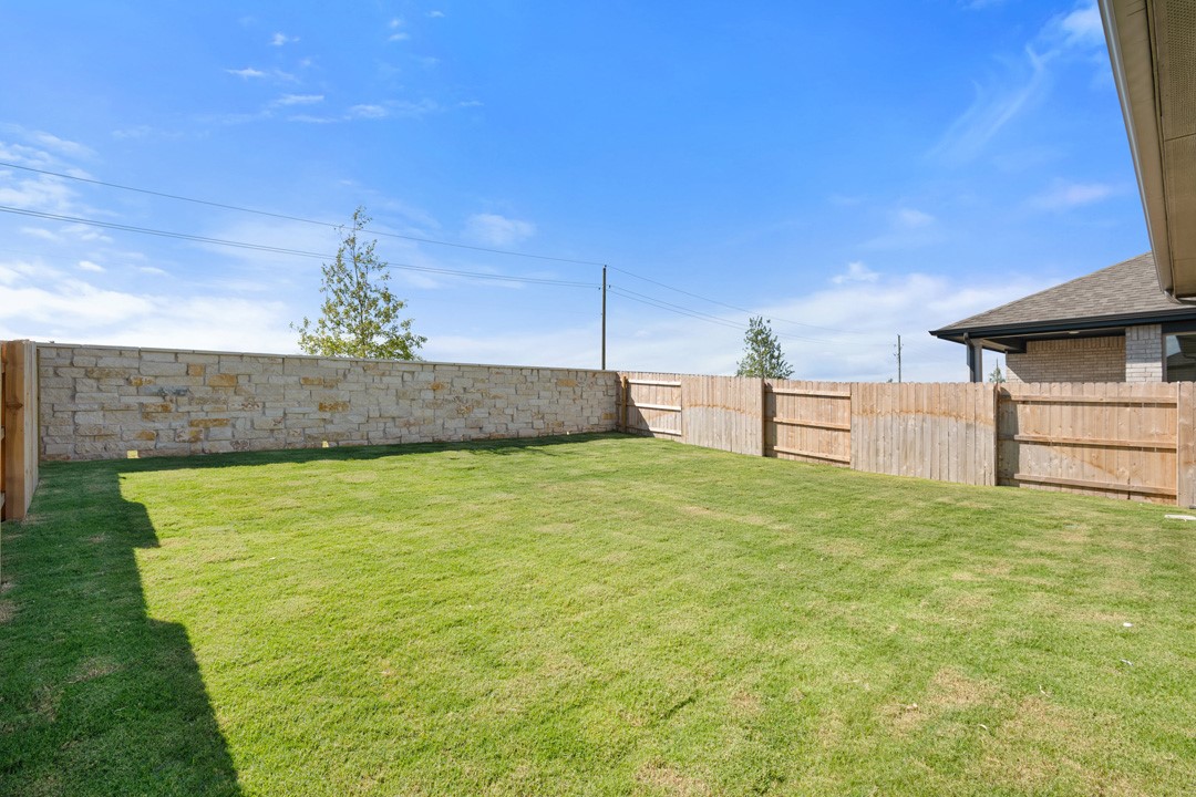 200 Brandywine Road Hutto, TX 78634 - Photo 35 of 39 a view of a backyard