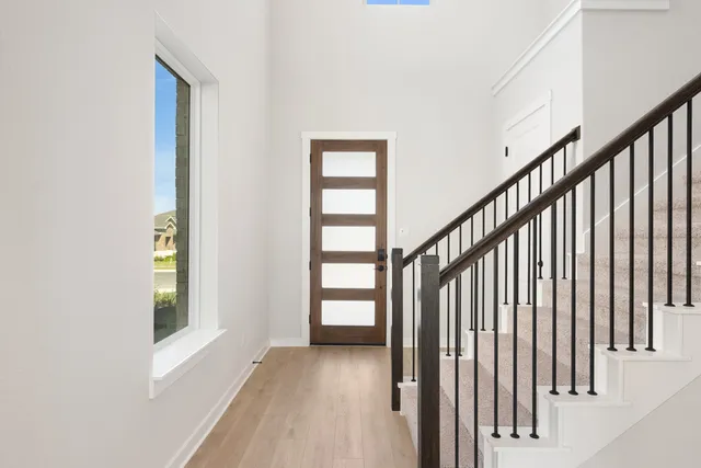 a view of an entryway with staircase