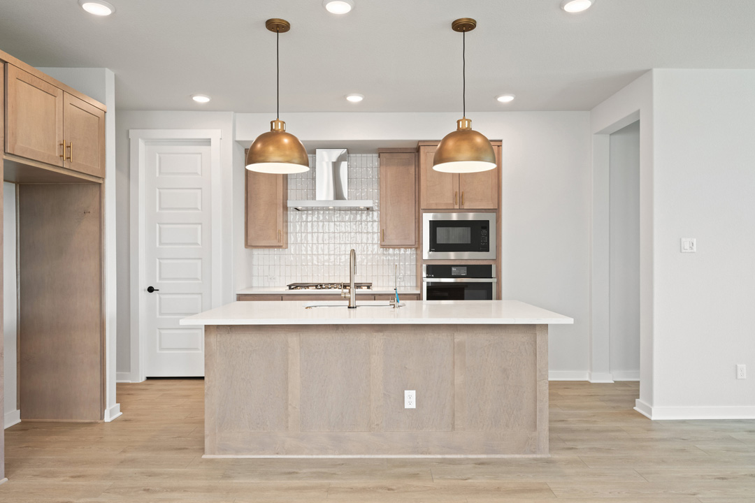 200 Brandywine Road Hutto, TX 78634 - Photo 6 of 39 a dining table chairs and a chandelier