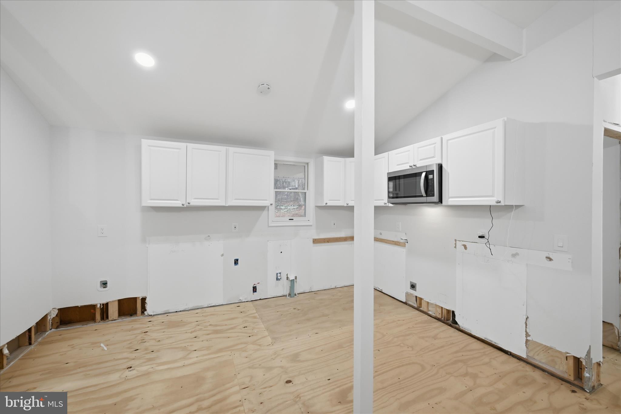 104 Inca Trail Winchester, VA 22602 - Photo 14 of 40 a kitchen with stainless steel appliances granite countertop white cabinets and refrigerator