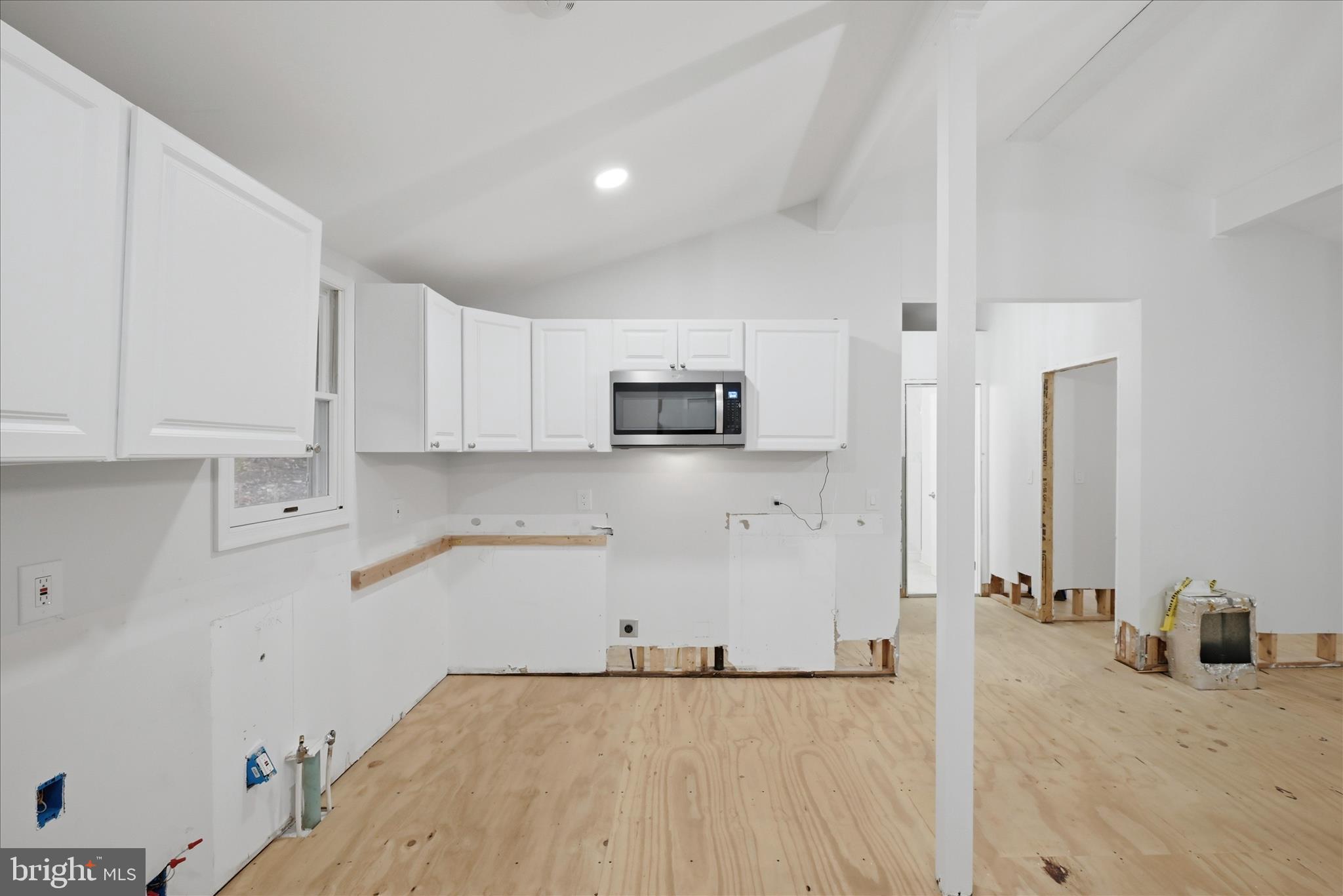 104 Inca Trail Winchester, VA 22602 - Photo 15 of 40 a view of a kitchen with microwave and cabinets