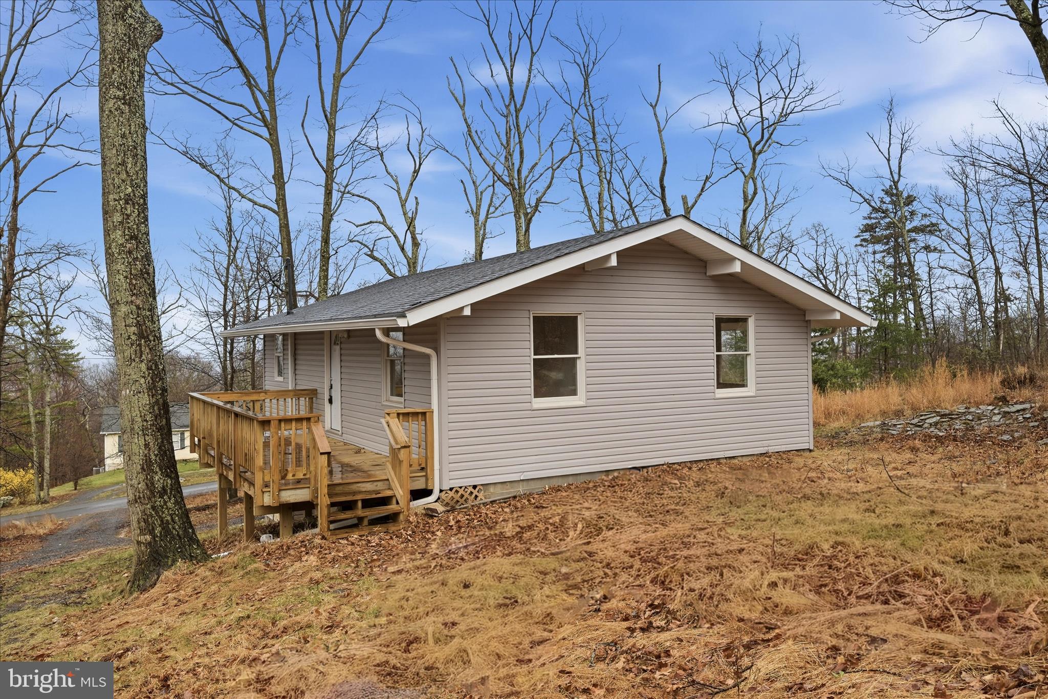 104 Inca Trail Winchester, VA 22602 - Photo 6 of 40 a backyard of a house with table and chairs