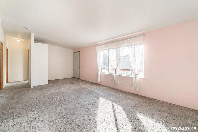 775 Hoffman Road Northeast, Unit 4 Salem, OR 97301 - Photo 18 of 23 a view of an empty room with a window