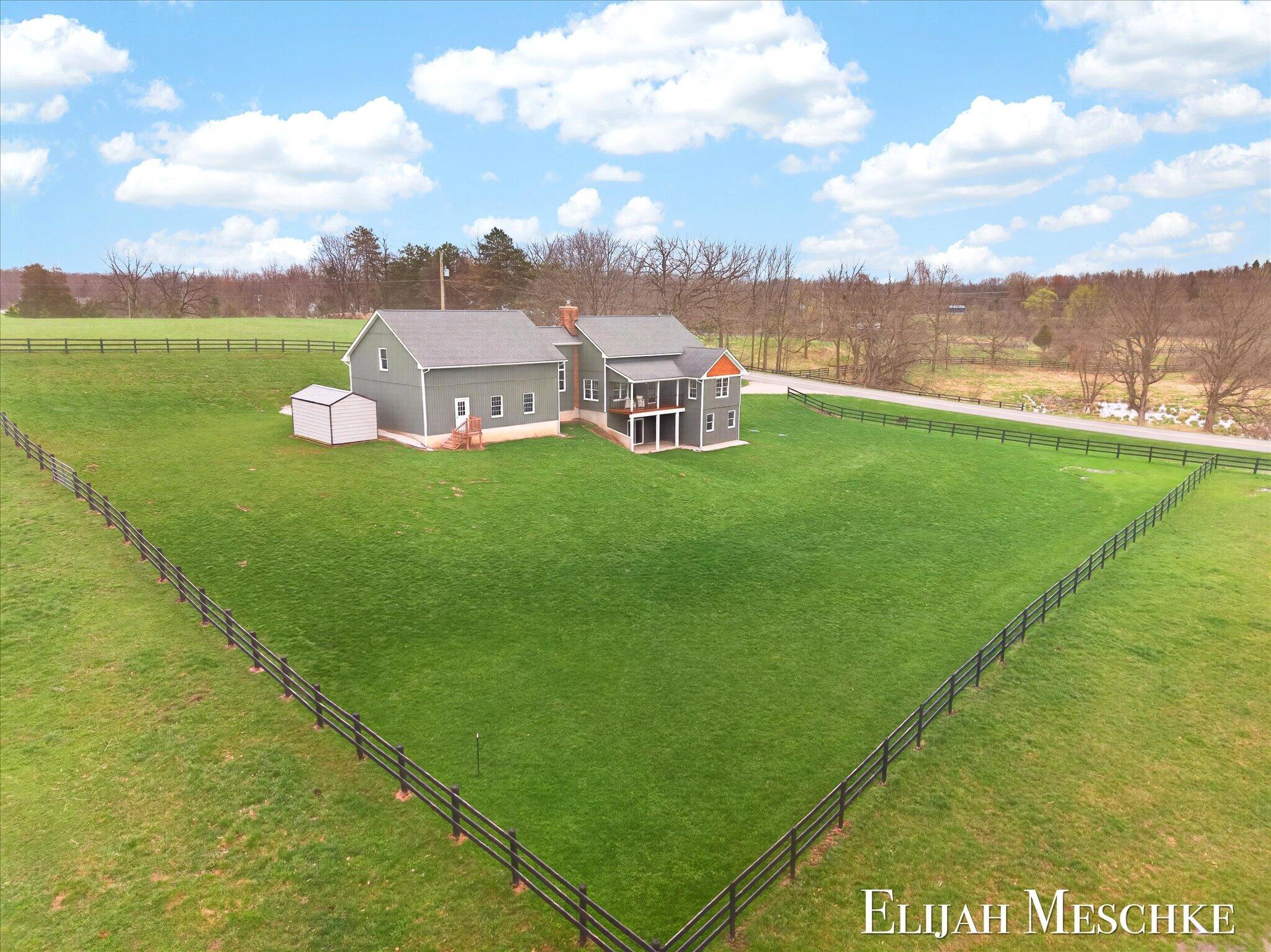 8977 2 Mile Road Northeast Ada, MI 49301 - Photo 3 of 62 69-DJI_20260415171834_0812_D_KYLE