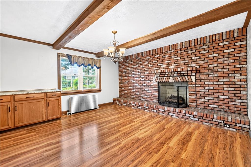 1301 Langeloth Road Burgettstown, PA 15021 - Photo 19 of 50 The dining room has a cool brick wall with fireplace 3 of 5...