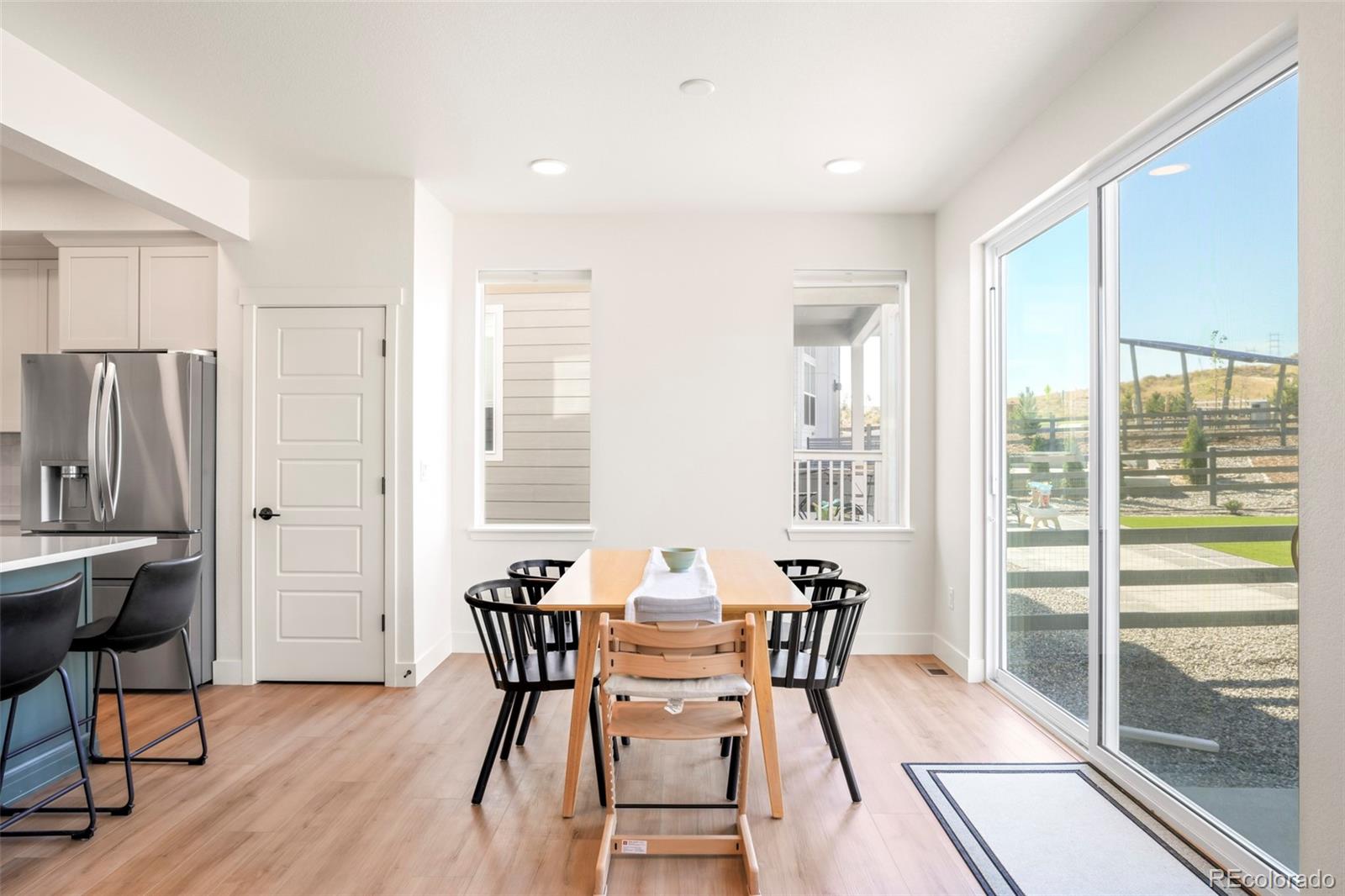 4899 Daven Road Morrison, CO 80465 - Photo 13 of 27 a view of a dining room with furniture window and outside view