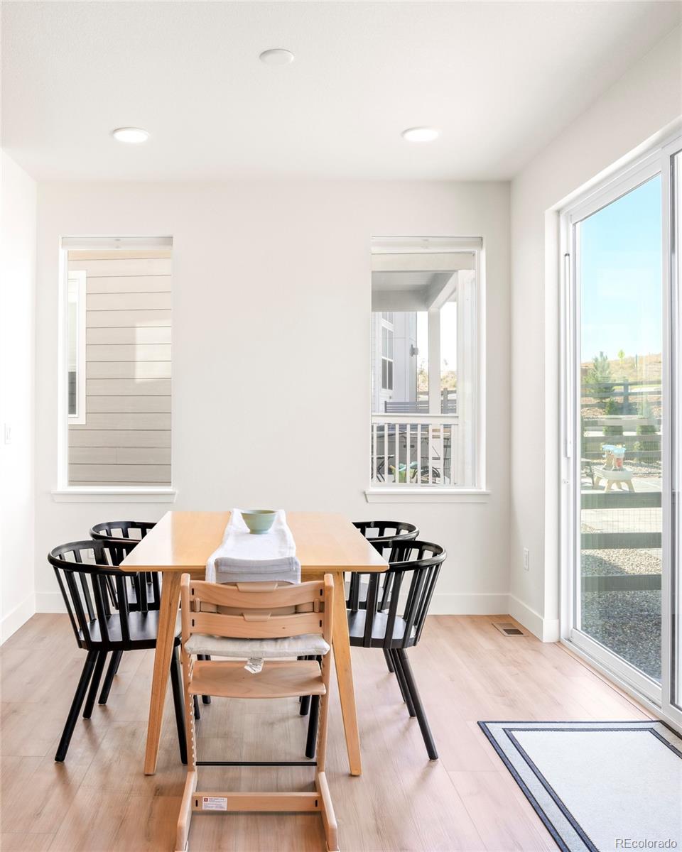 4899 Daven Road Morrison, CO 80465 - Photo 14 of 27 a dining room with furniture and window