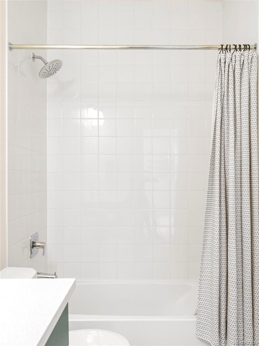 4899 Daven Road Morrison, CO 80465 - Photo 21 of 27 a bathroom with a shower and a sink