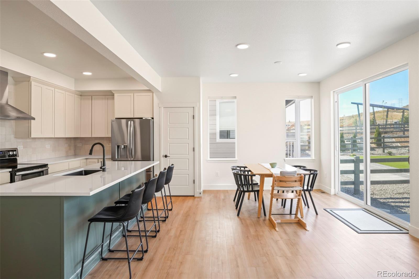 4899 Daven Road Morrison, CO 80465 - Photo 3 of 27 a view of a dining room with furniture window and outside view