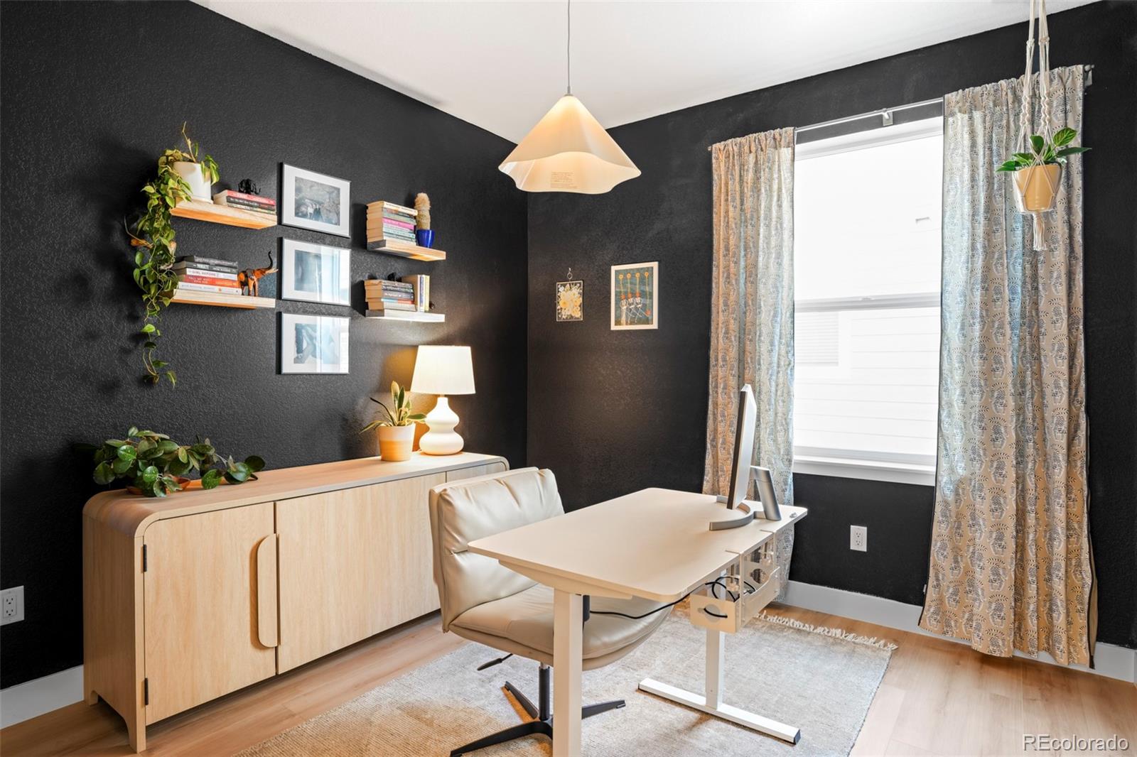 4899 Daven Road Morrison, CO 80465 - Photo 10 of 27 a living room with furniture and a window