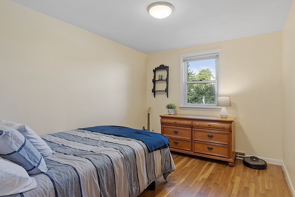233 College Farm Road Waltham, MA 02451 - Photo 15 of 41 a bedroom with a bed and a window