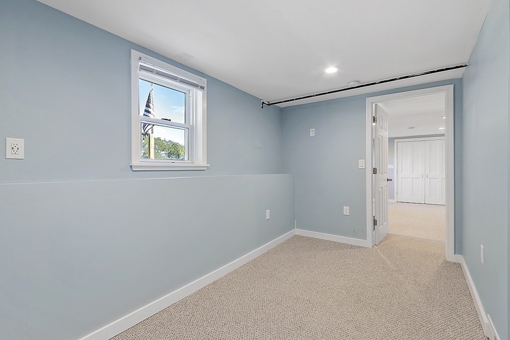 233 College Farm Road Waltham, MA 02451 - Photo 25 of 41 an empty room with windows and closet