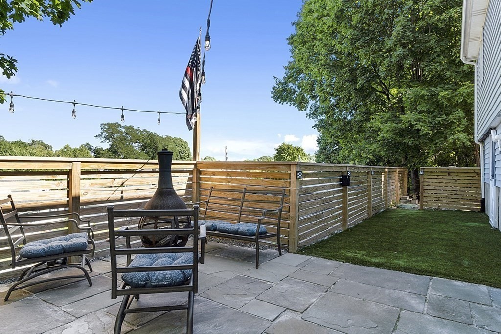 233 College Farm Road Waltham, MA 02451 - Photo 31 of 41 a view of a chairs and table on the terrace
