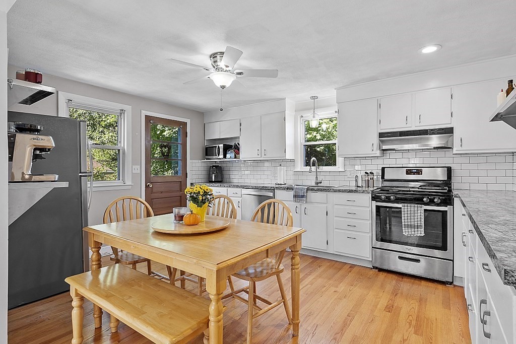233 College Farm Road Waltham, MA 02451 - Photo 5 of 41 a kitchen with a sink cabinets and appliances