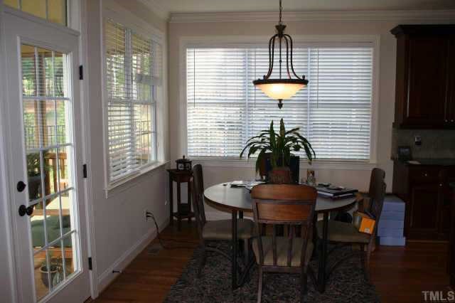 9315 Tabriz Raleigh, NC 27614 - Photo 3 of 10 a dining room with furniture and window