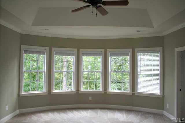 9315 Tabriz Raleigh, NC 27614 - Photo 8 of 10 a view of an empty room with a window