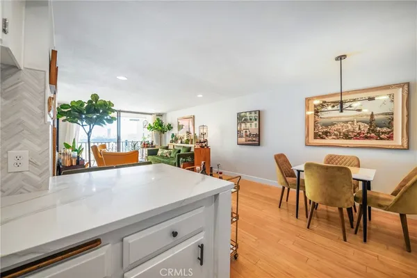 a view living room with furniture and a potted plant