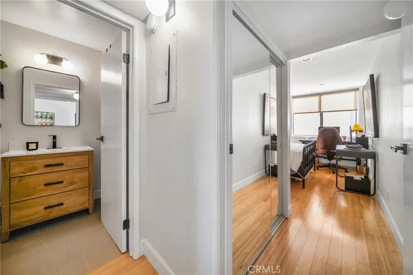 a bed room with a bed and dresser