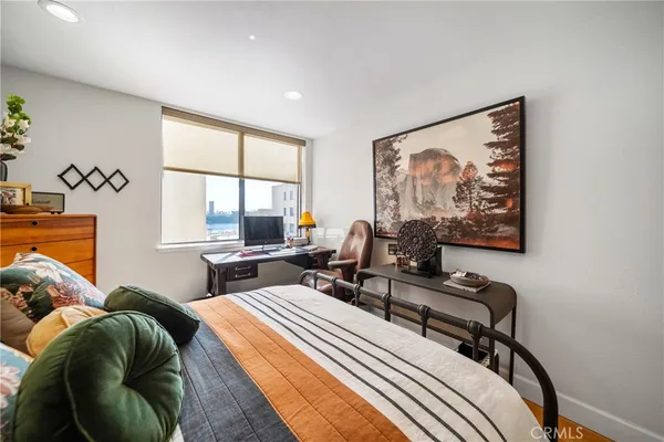 a view of living room with furniture and a flat screen tv