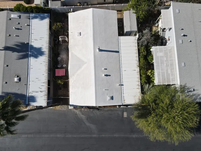 a bathroom with a mirror and a shower