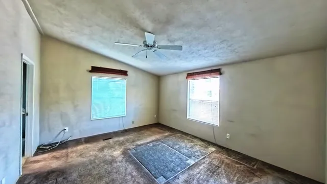 a view of livingroom with furniture and a fireplace