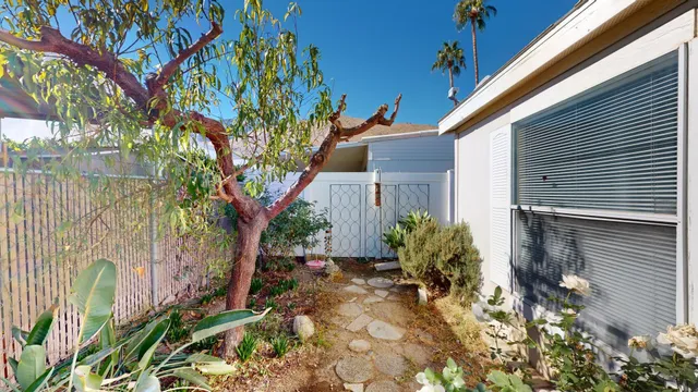 a backyard of a house with lots of green space