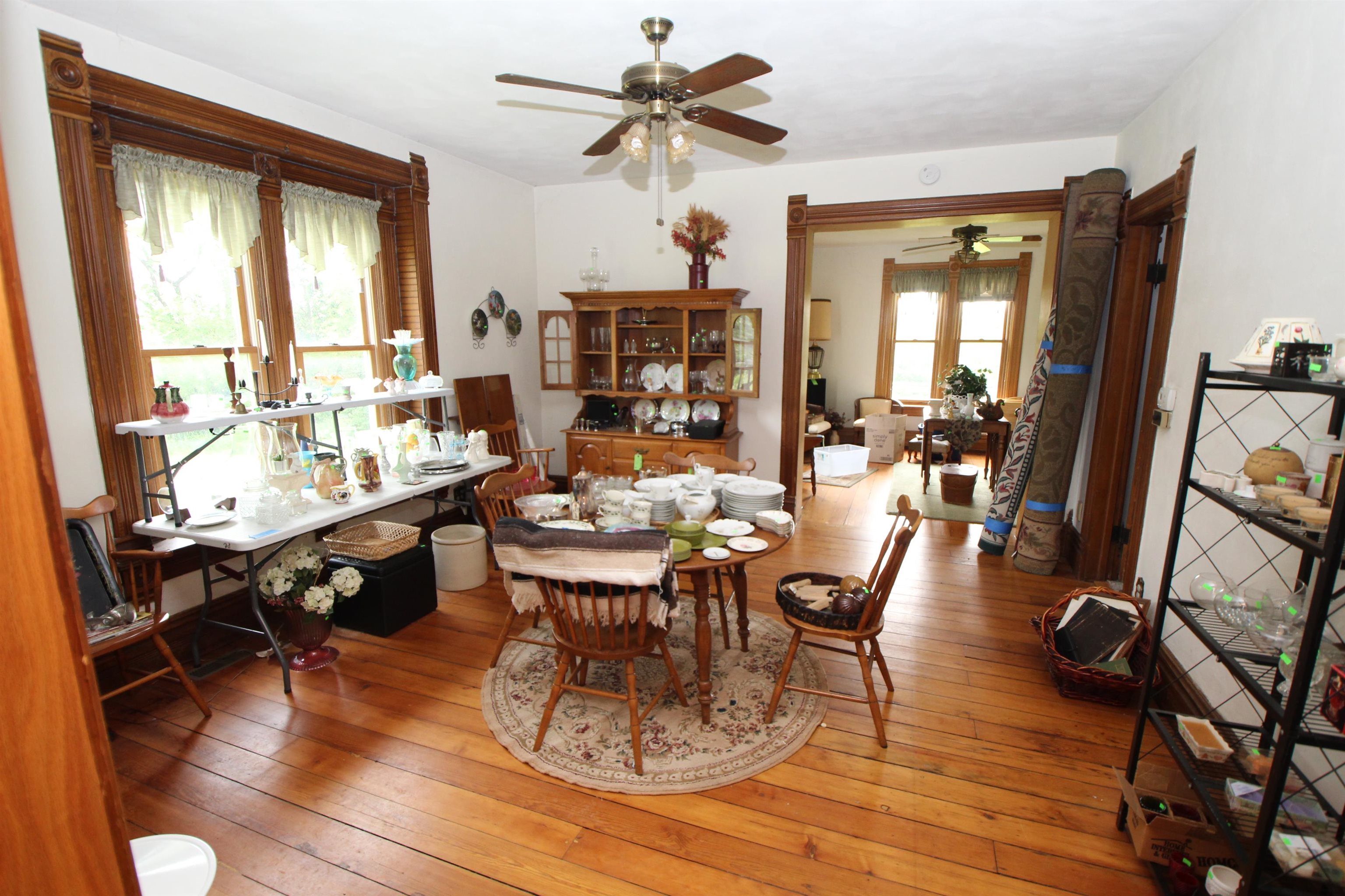 5250 Harvey Road Caledonia, IL 61011 - Photo 12 of 17 a view of a dining room with furniture window and wooden floor