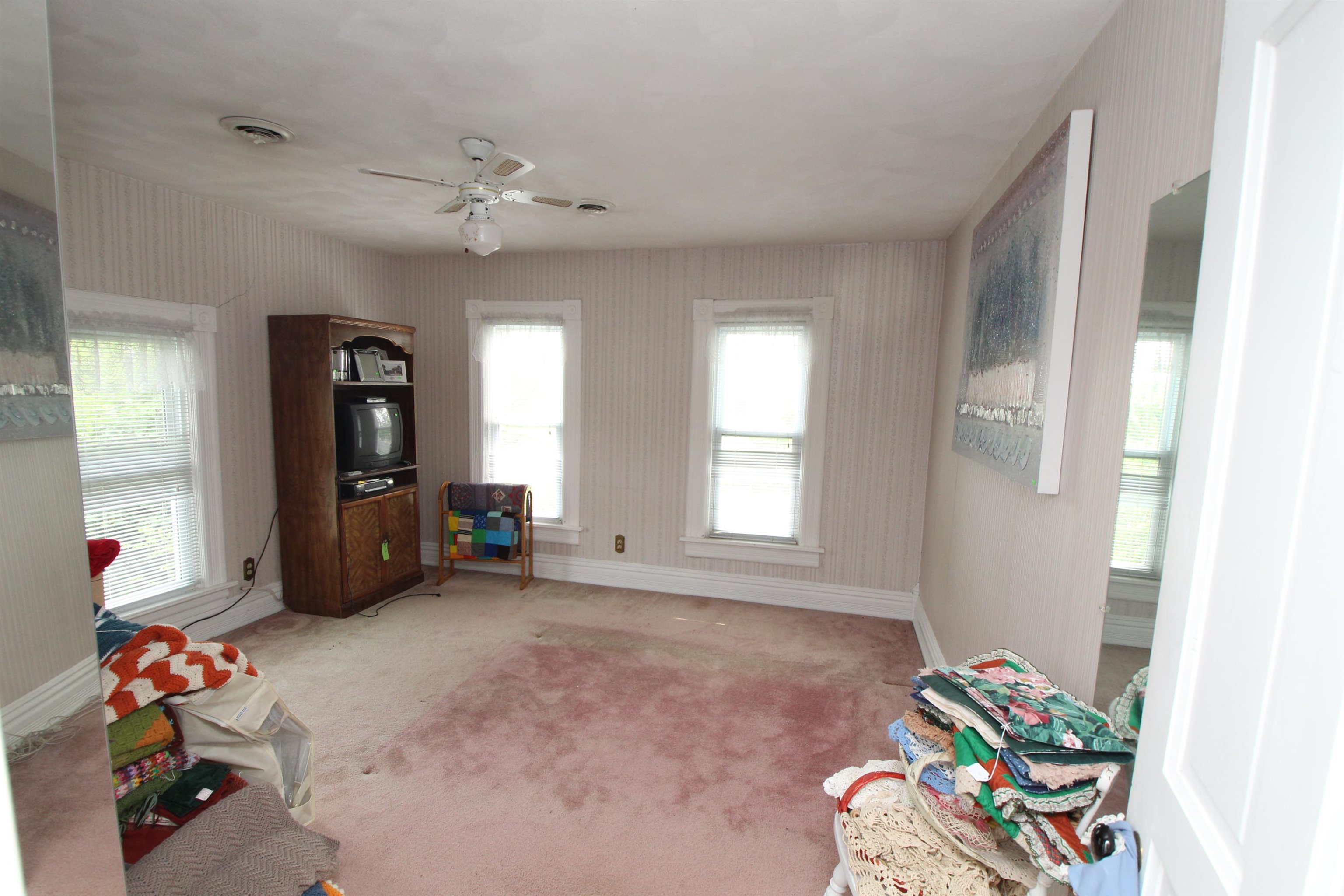 5250 Harvey Road Caledonia, IL 61011 - Photo 15 of 17 a living room with furniture and a chandelier