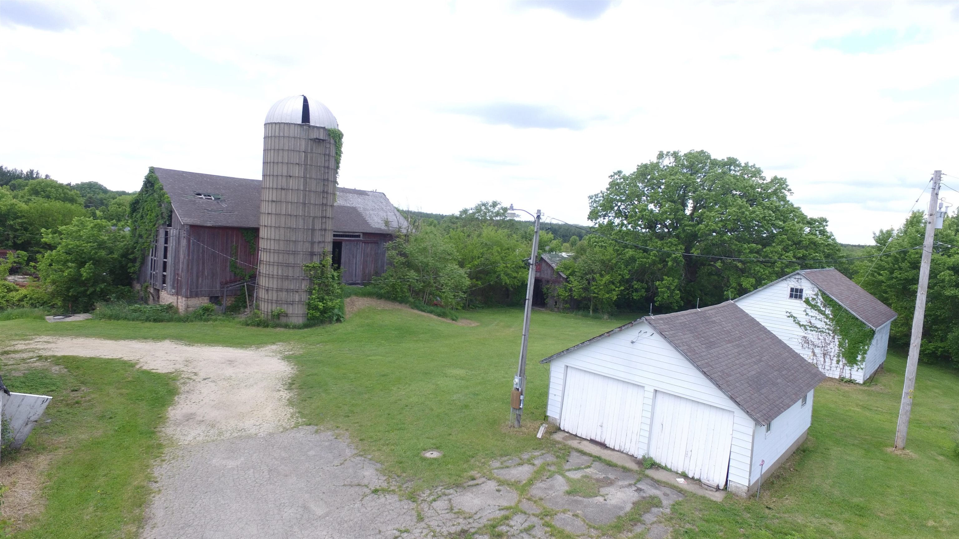 5250 Harvey Road Caledonia, IL 61011 - Photo 8 of 17 a view of a house with a yard and pathway