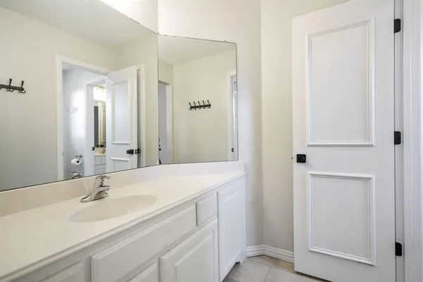 a view of a house with swimming pool and sitting area