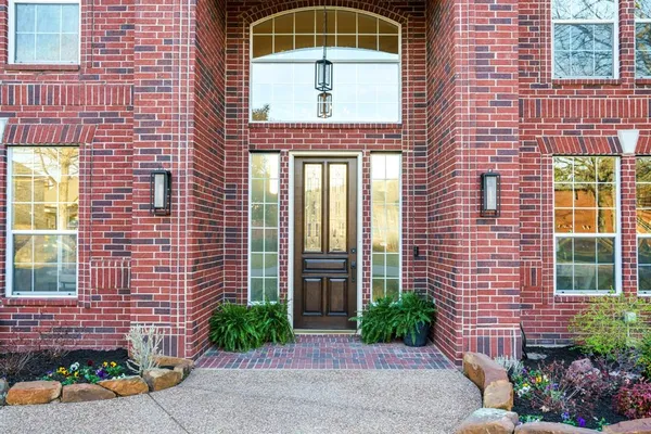 a front view of a house having yard