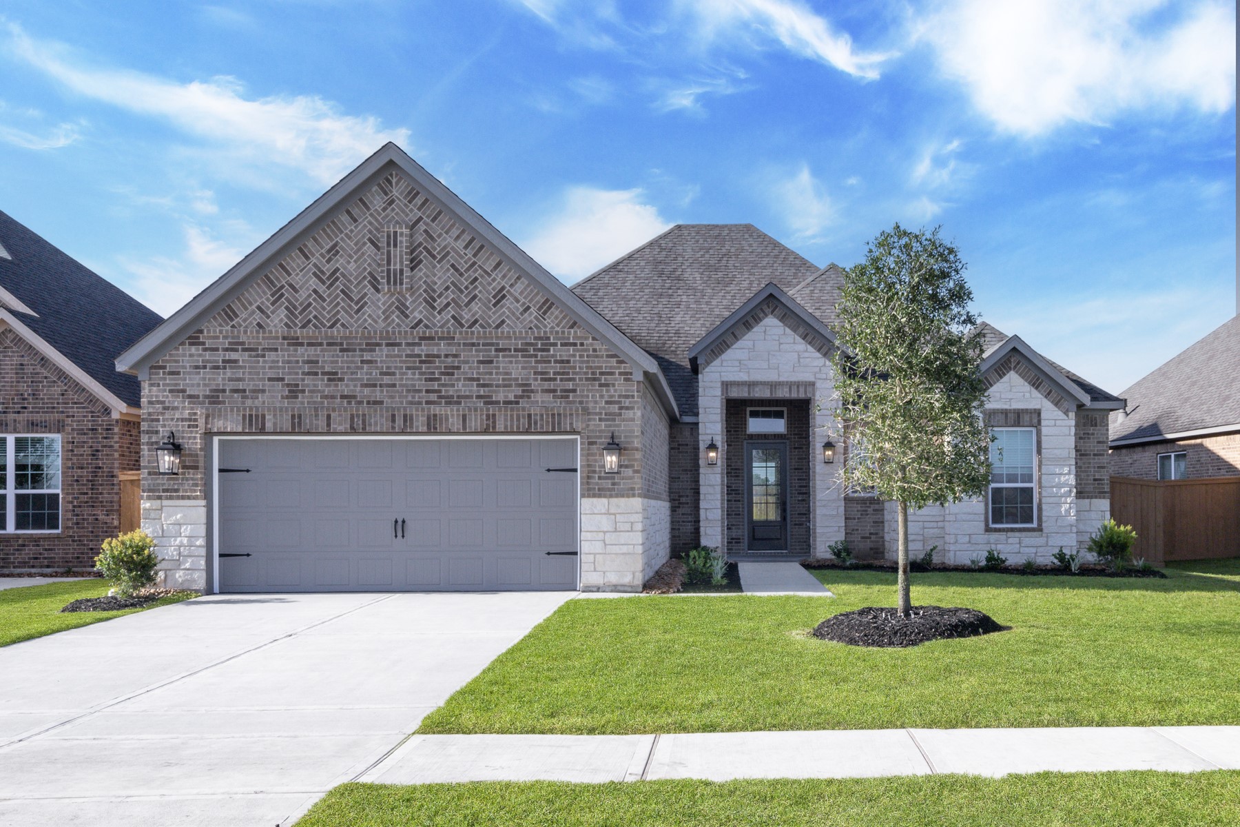 1907 June Lk Lane Iowa Colony, TX 77583 - Photo 1 of 11 a view of a house with a yard and garage