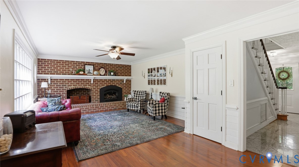 10716 Chalkley Road Richmond, VA 23237 - Photo 20 of 46 a living room with furniture and a fireplace