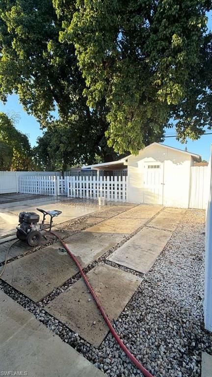 4439 23rd Place Southwest Naples, FL 34116 - Photo 10 of 15 View of patio / terrace