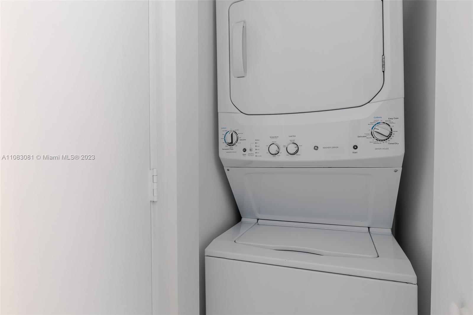 45 Southwest 9th Street, Unit 2207 Miami, FL 33130 - Photo 13 of 31 a utility room with dryer and washer