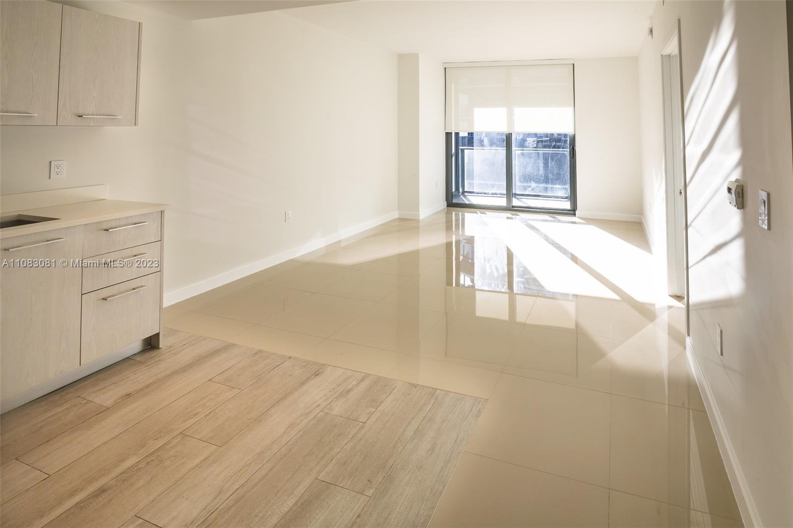 45 Southwest 9th Street, Unit 2207 Miami, FL 33130 - Photo 15 of 31 a view of an empty room with a window