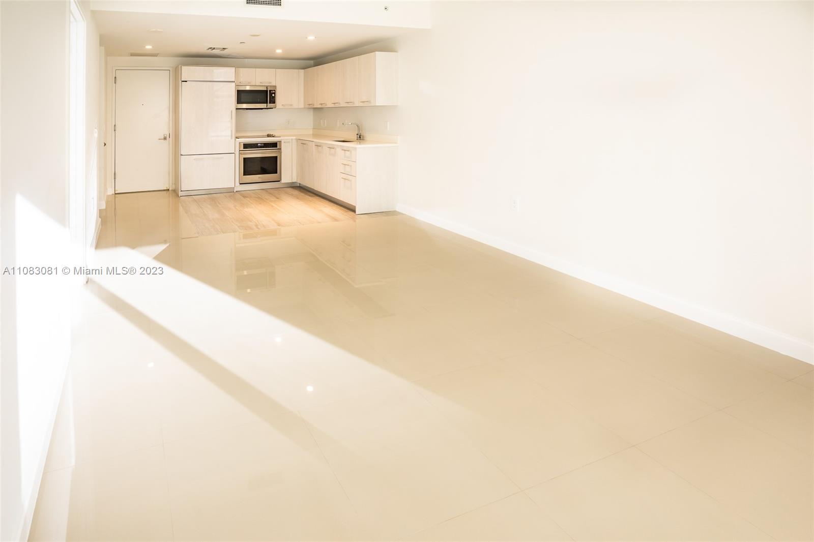 45 Southwest 9th Street, Unit 2207 Miami, FL 33130 - Photo 16 of 31 a view of kitchen with wooden floor