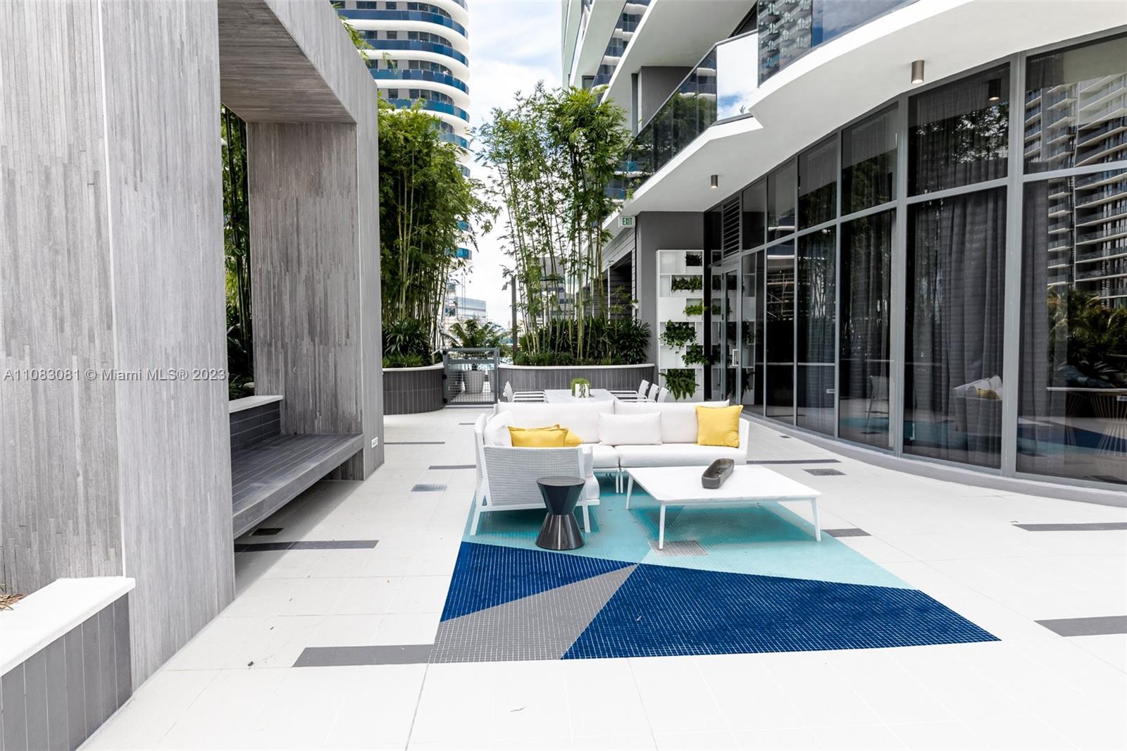 45 Southwest 9th Street, Unit 2207 Miami, FL 33130 - Photo 24 of 31 a swimming pool with outdoor seating and yard