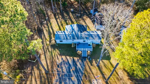 a view of an outdoor space with a yard