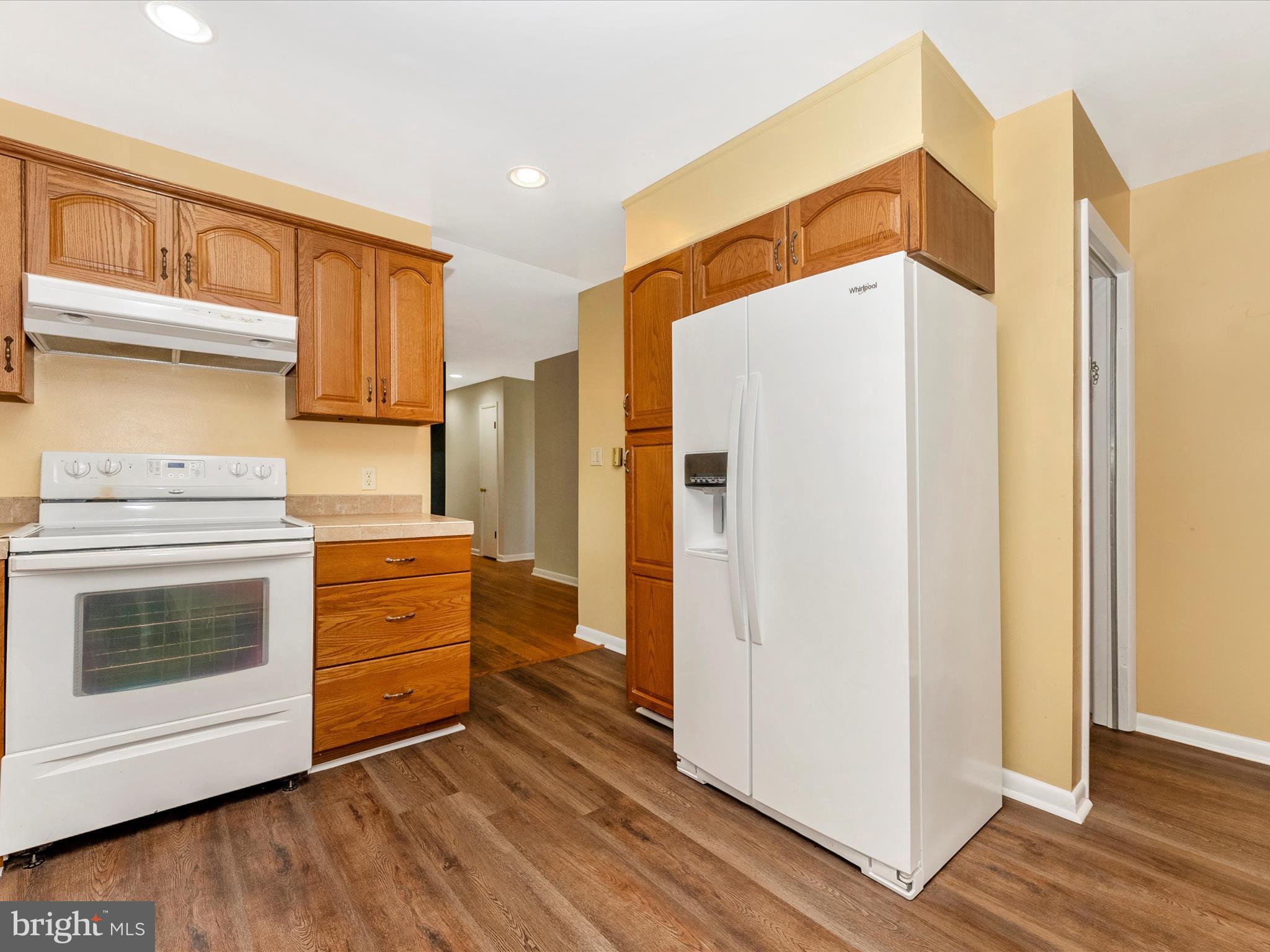 2833 Roderick Road Frederick, MD 21704 - Photo 13 of 41 a kitchen with stainless steel appliances a refrigerator and a stove top oven