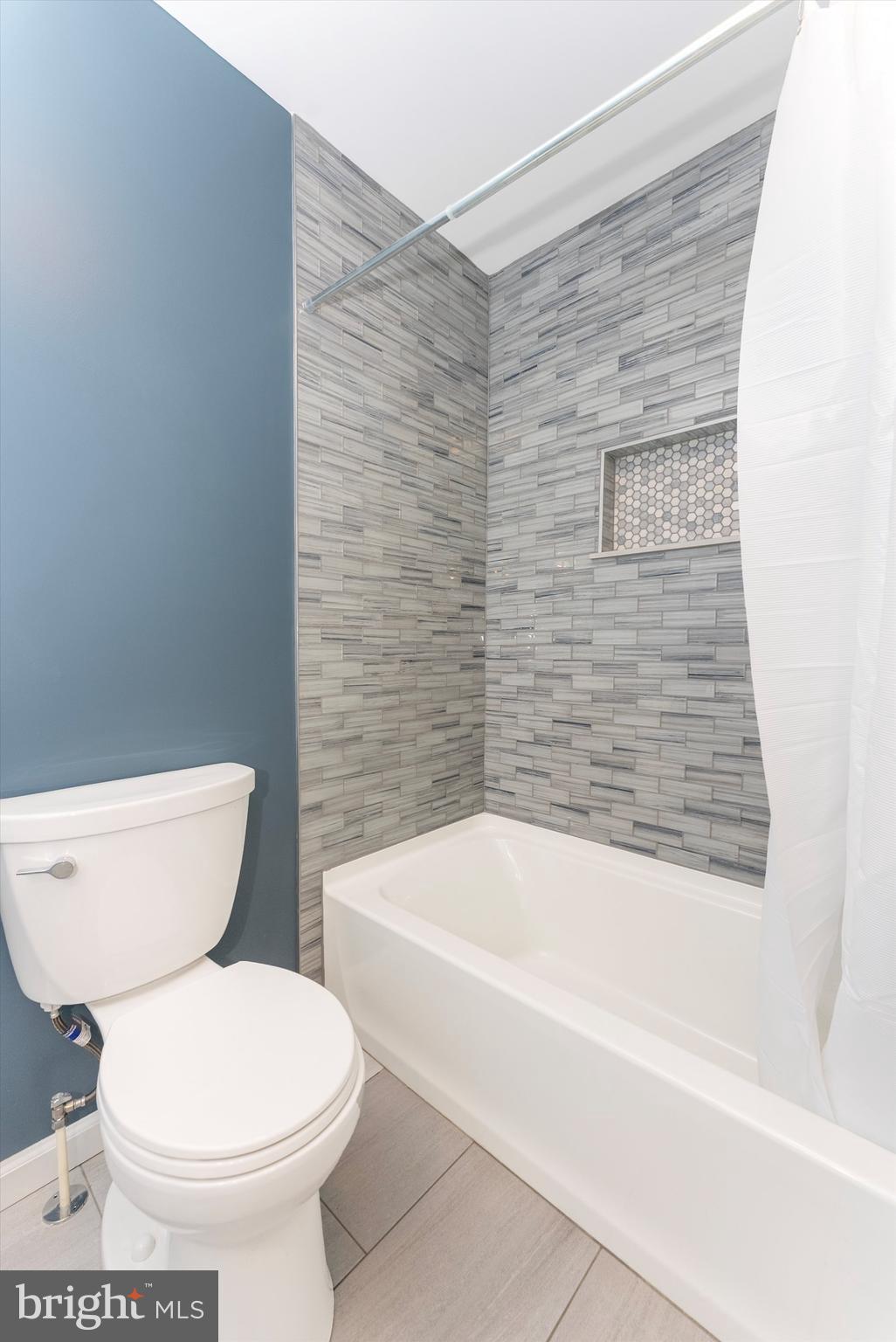 2833 Roderick Road Frederick, MD 21704 - Photo 16 of 41 a bathroom with a toilet and a bathtub