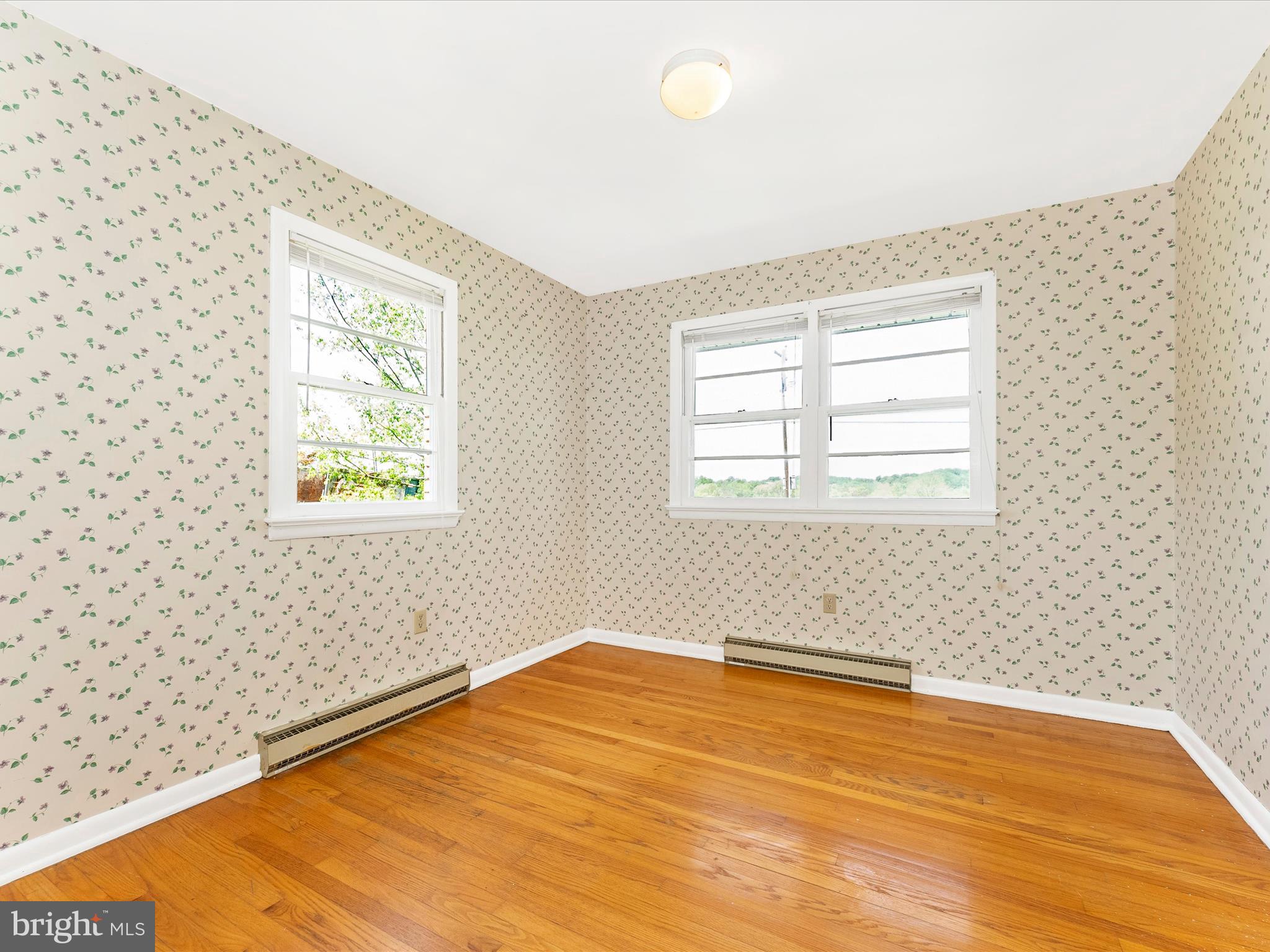 2833 Roderick Road Frederick, MD 21704 - Photo 22 of 41 a view of empty room with wooden floor and fan