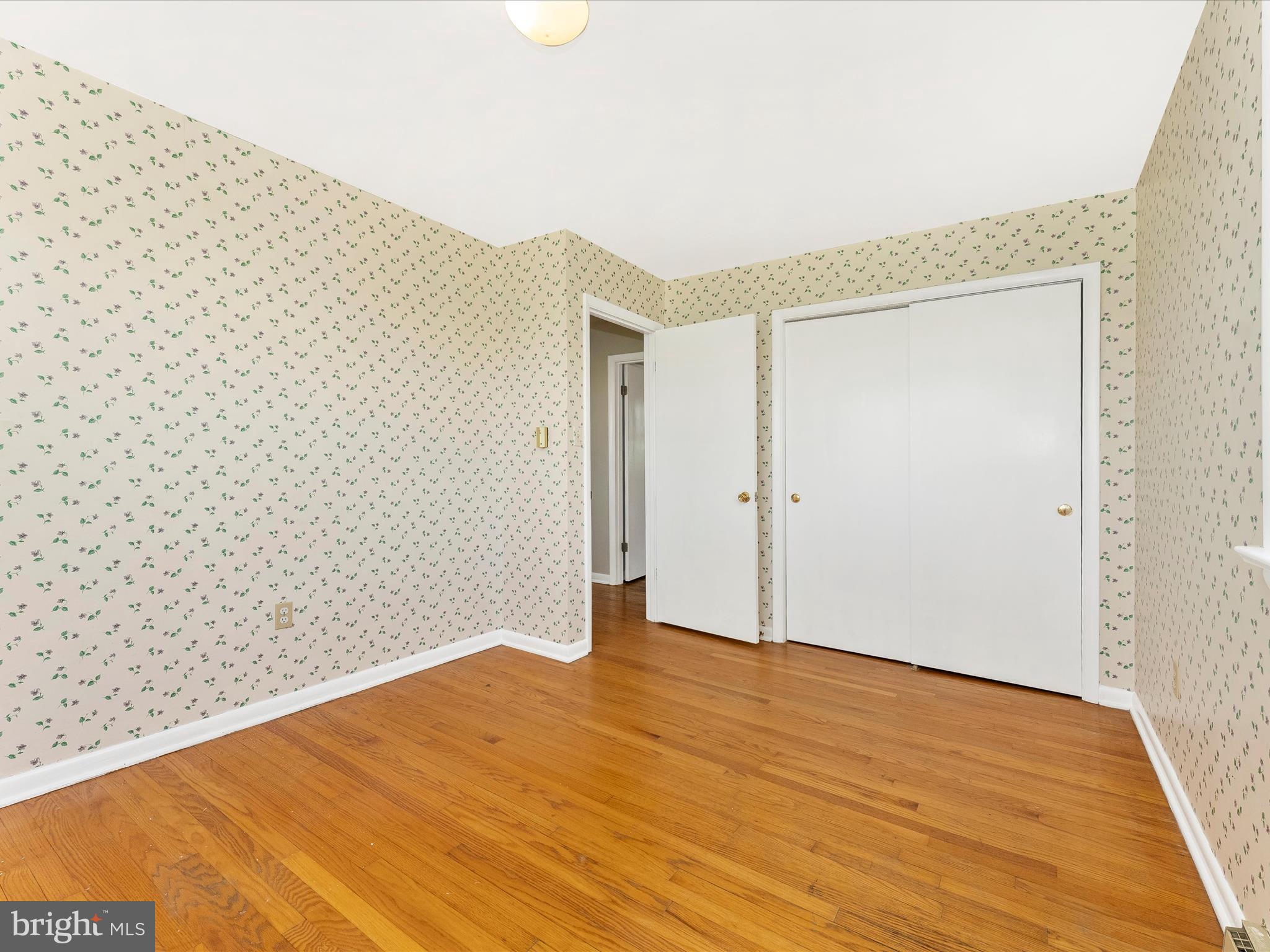 2833 Roderick Road Frederick, MD 21704 - Photo 23 of 41 a view of empty room with wooden floor