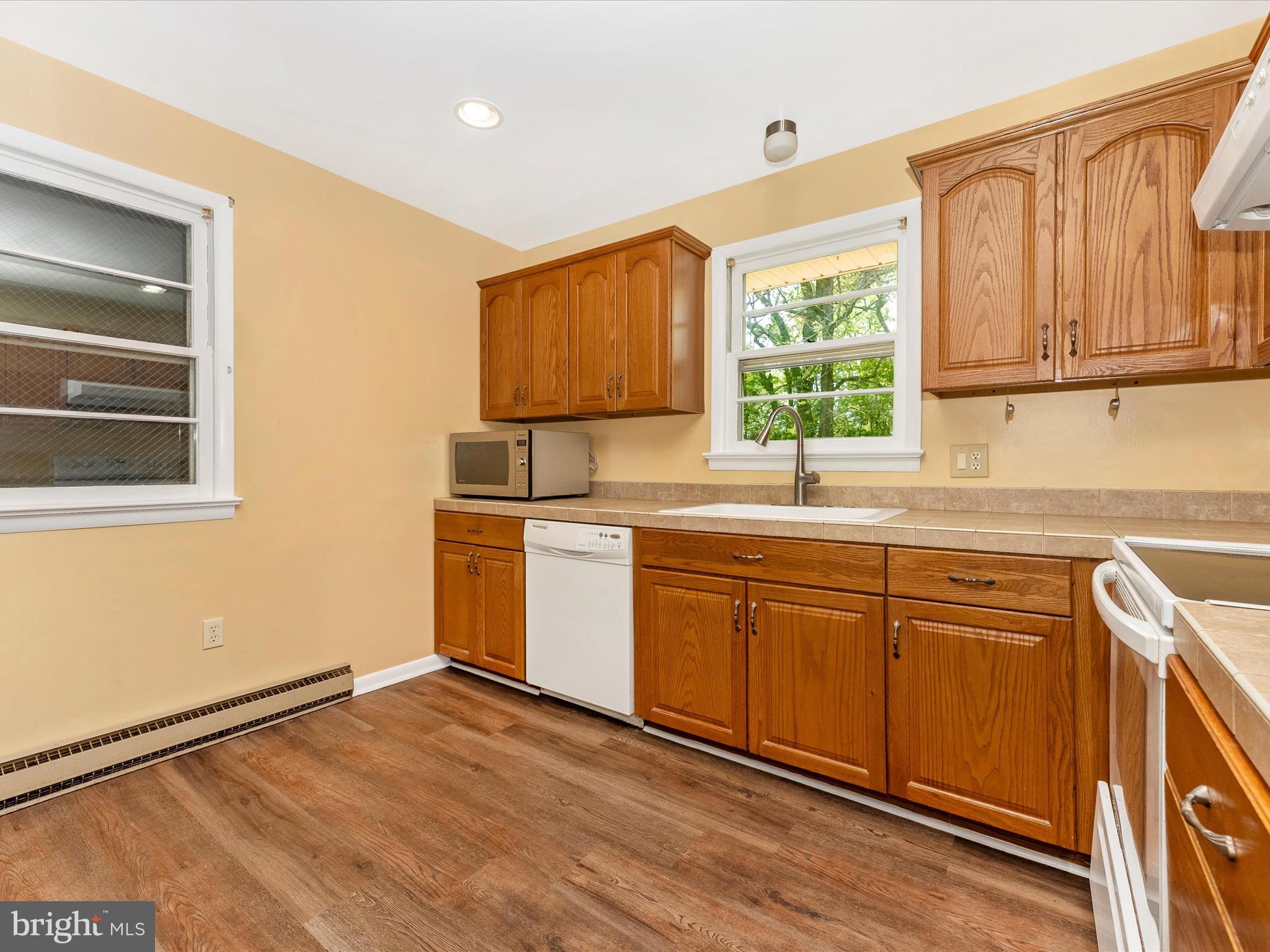 2833 Roderick Road Frederick, MD 21704 - Photo 10 of 41 a kitchen with sink window and cabinets