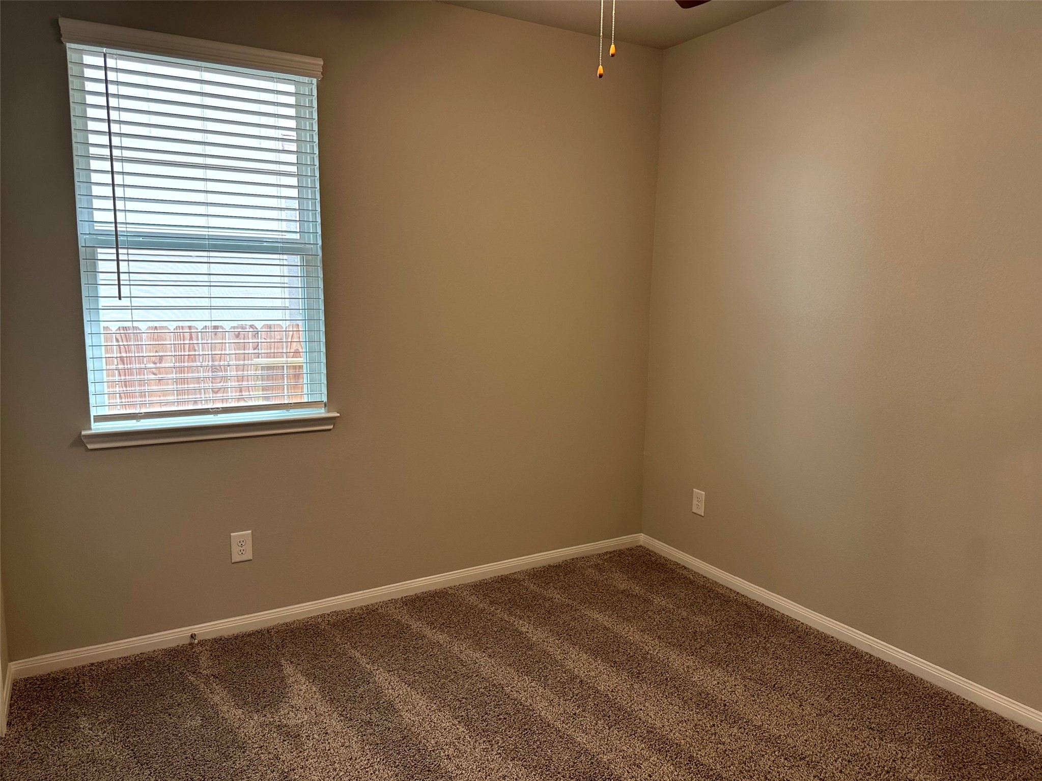 7072 Silverleaf Oak Street Conroe, TX 77304 - Photo 13 of 18 Secondary bedroom.